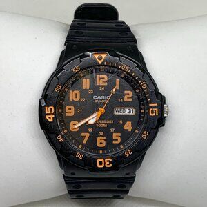 Casio men’s day date watch MRW200H black orange tone 43mm resin band running